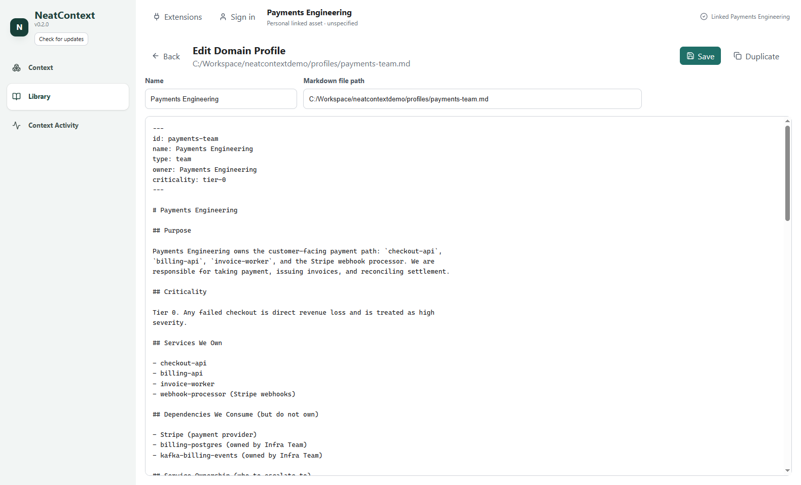 The domain profile editor: metadata on top, raw Markdown below